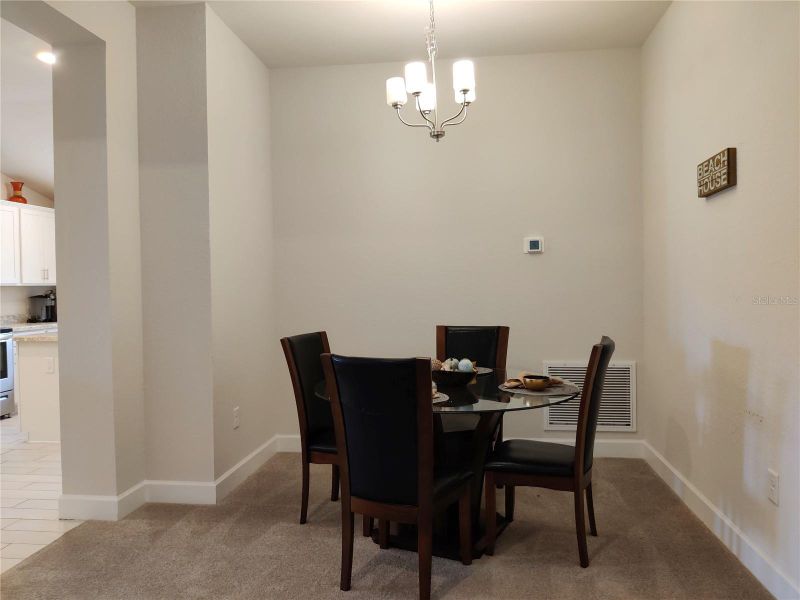 Furnished interior view inside a new home in Sunset Landing, Spring Hill (Image 6).