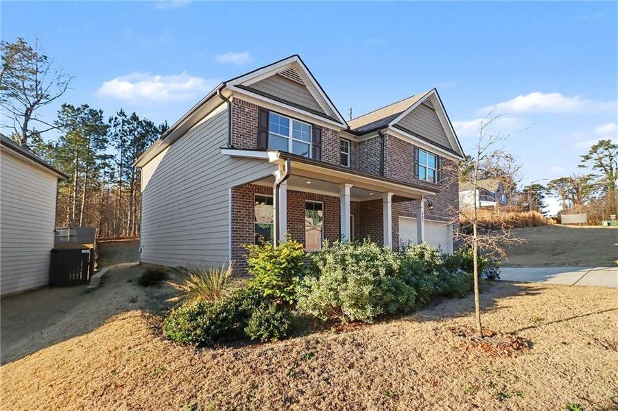 Front exterior of a new home in , Atlanta, GA, highlighting curb appeal (Image 28).