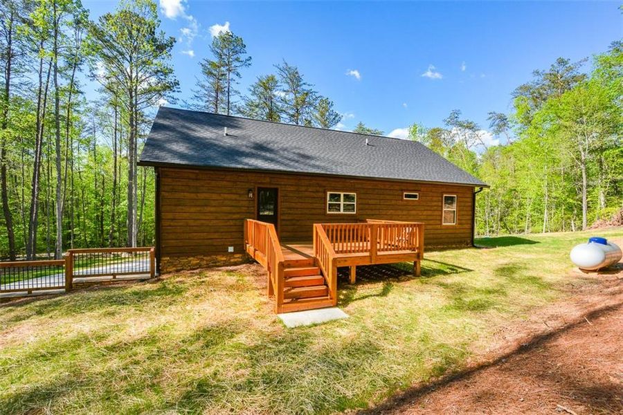 Exterior details and patio area of a home in , Ellijay (Image 22).