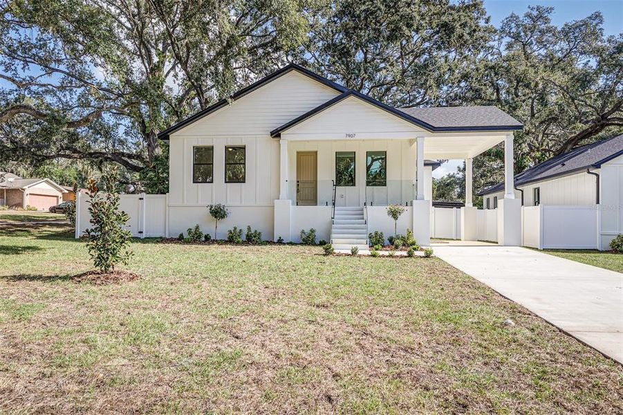 Front exterior of a new home in , Tampa, FL, highlighting curb appeal (Image 16).