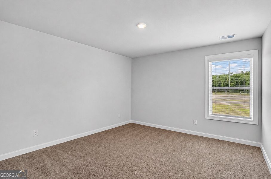 Spacious, unfurnished interior of a new home in The Fairways at Mirror Lake, Villa Rica (Image 44). Spacious, unfurnished interior of a new home in The Fairways at Mirror Lake, Villa Rica (Image 44).