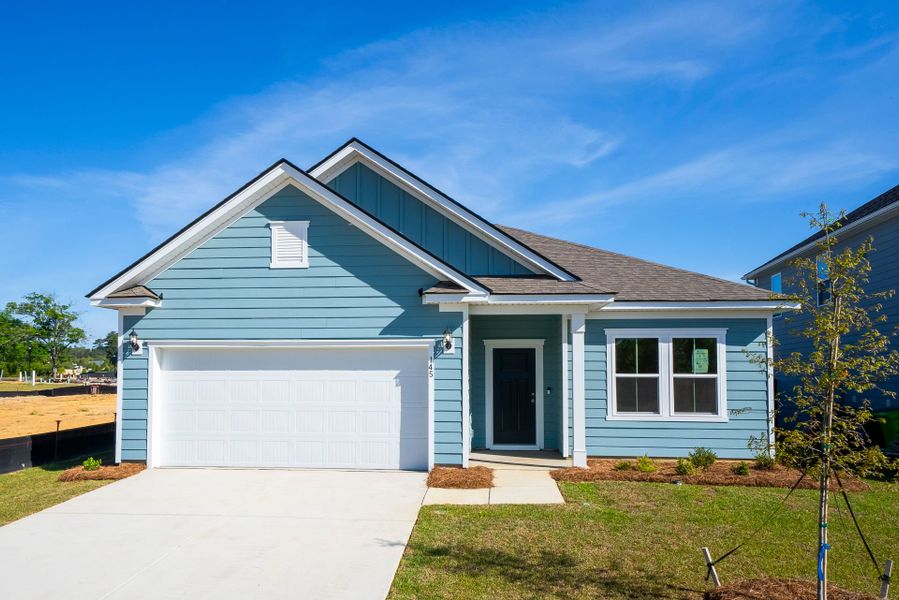 Front exterior of a new home in Monroe Preserve, Chapin, SC, highlighting curb appeal (Image 26).