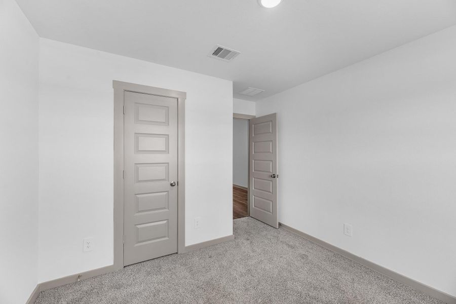 Spacious, unfurnished interior of a new home in Watermark, Alvin (Image 23).