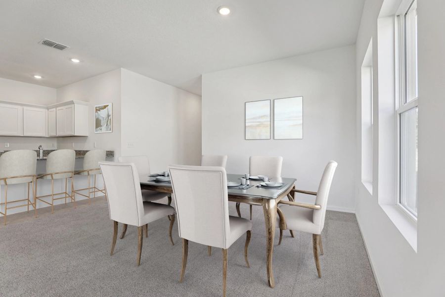 Representative furnished interior of a home built from the Halo by Starlight Homes in Hawks Run, Kissimmee (Image 5).