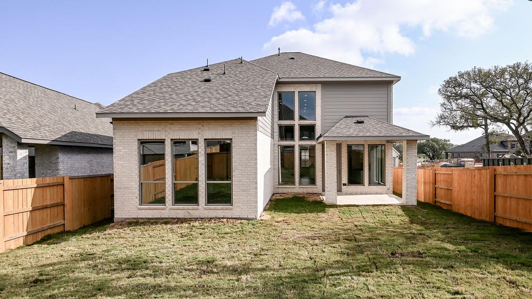 Exterior details and patio area of a home in 6 Creeks, Kyle (Image 2).