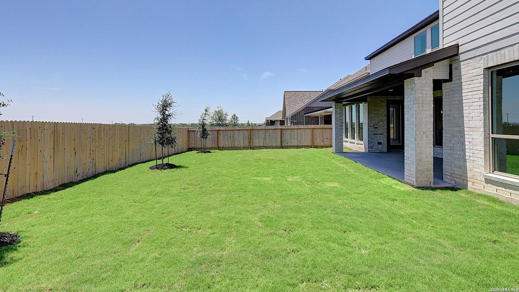 Exterior details and patio area of a home in Kallison Ranch, San Antonio (Image 3).