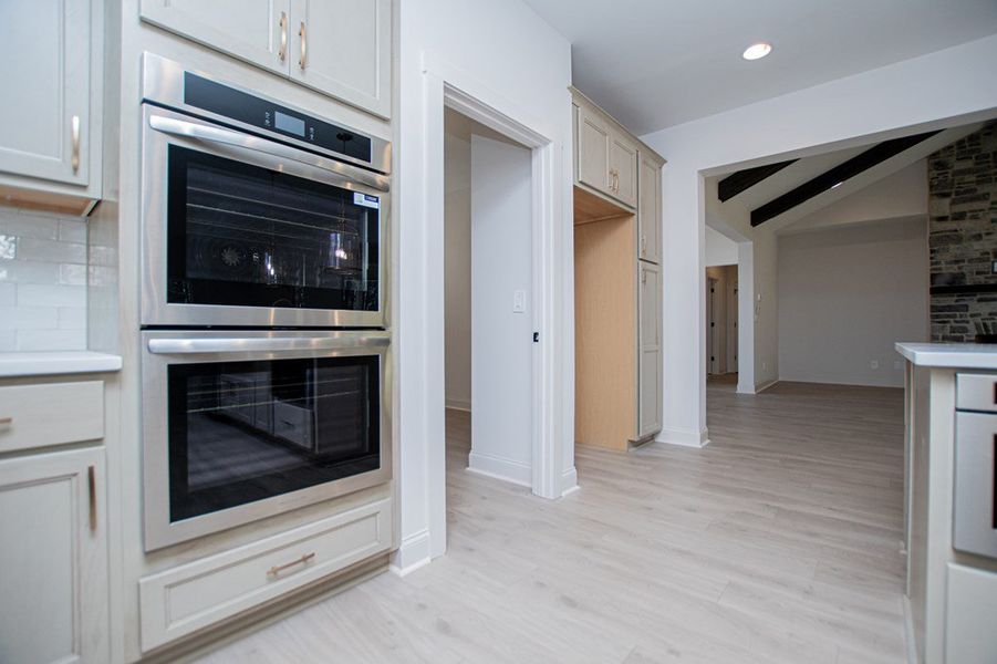 Furnished interior view inside a new home in The Reserve at Red Oaks, Carrollton (Image 7).