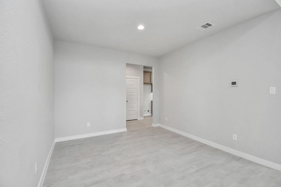 Make memories gathered around the table with your family and friends! This spacious dining room features elegant flooring, custom paint, and adjacent to family room and kitchen for open concept feel. Sample photo of completed home with similar floor plan. Actual colors and selections may vary. Make memories gathered around the table with your family and friends! This spacious dining room features elegant flooring, custom paint, and adjacent to family room and kitchen for open concept feel. Sample photo of completed home with similar floor plan. Actual colors and selections may vary.