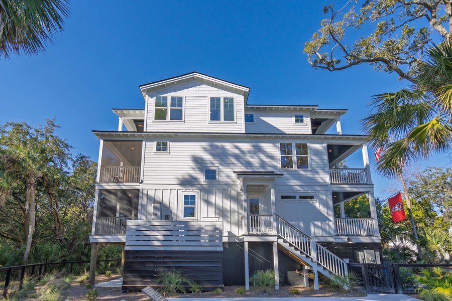Front exterior of a new home in , Edisto Island, SC, highlighting curb appeal (Image 1). Front exterior of a new home in , Edisto Island, SC, highlighting curb appeal (Image 1).
