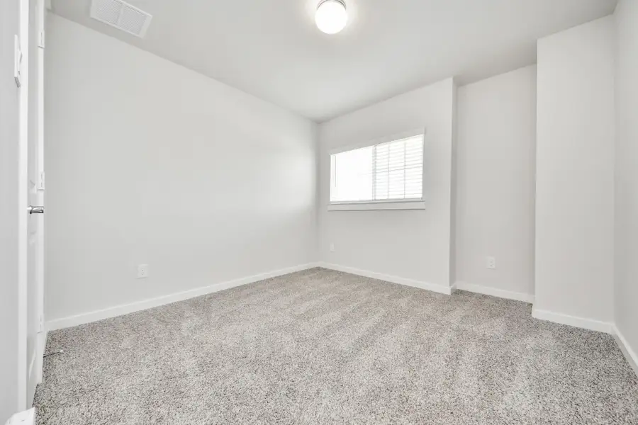 Spacious, unfurnished interior of a new home in Willow Trace, Spring (Image 24).