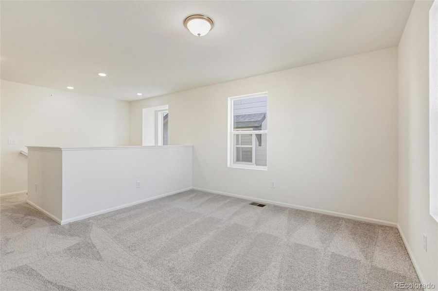 Spacious, unfurnished interior of a new home in Turnberry, Commerce City (Image 19).