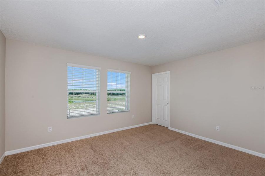 Spacious, unfurnished interior of a new home in Crosswinds, Haines City (Image 22).
