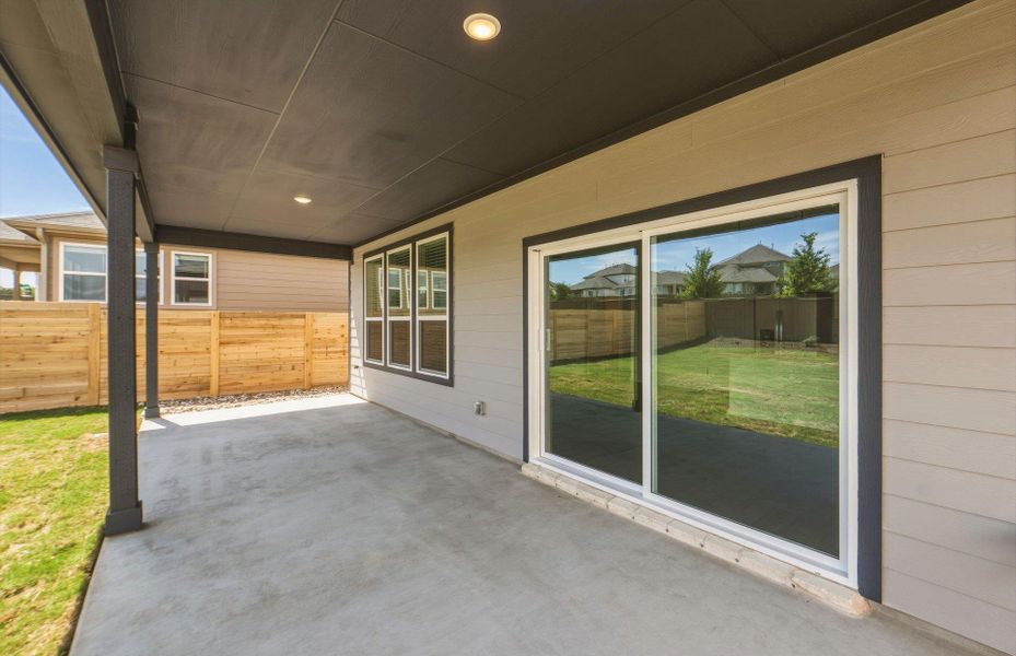 Exterior details and patio area of a home in Horizon Lake, Leander (Image 20).