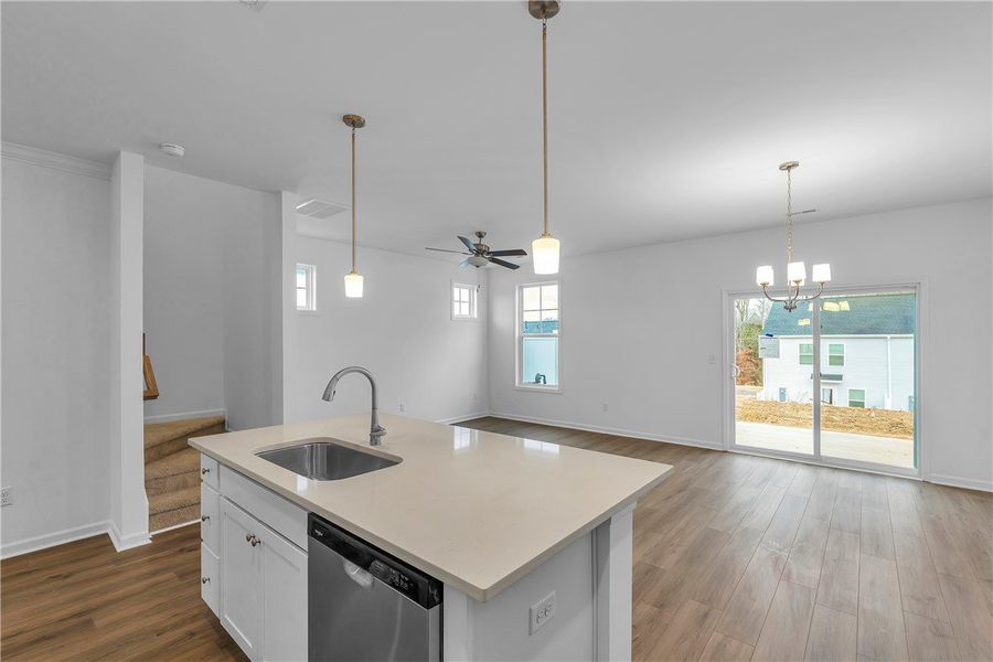 This open concept space features an inviting kitch This open concept space features an inviting kitch