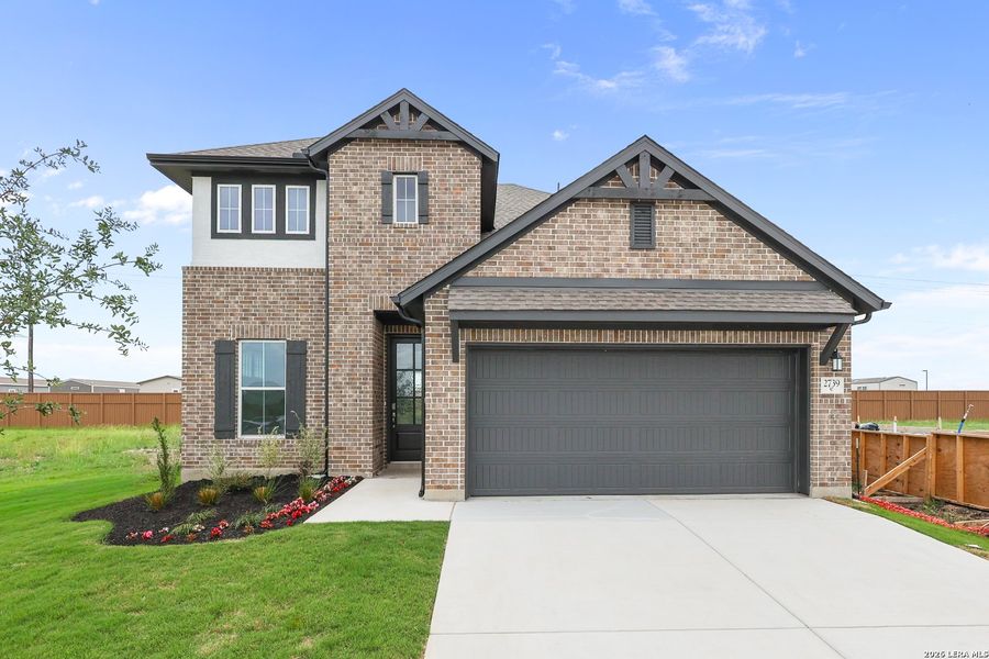 Front exterior of a new home in Sunflower Ridge, New Braunfels, TX, highlighting curb appeal (Image 24).