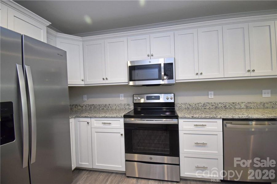 Furnished interior view inside a new home in , Hickory (Image 5).