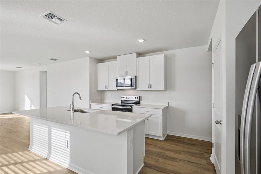 Furnished interior view inside a new home in Salt Meadows - Premier Series, Parrish (Image 11).