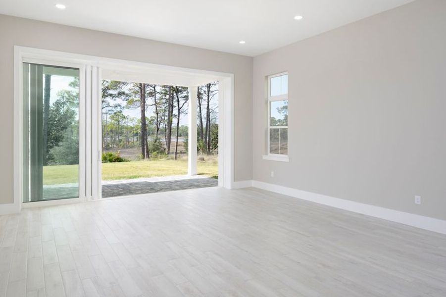 Representative unfurnished interior of a home built from the Grand Mainsail by Minto Communities in Latitude Margaritaville Watersound, Panama City Beach (Image 24).