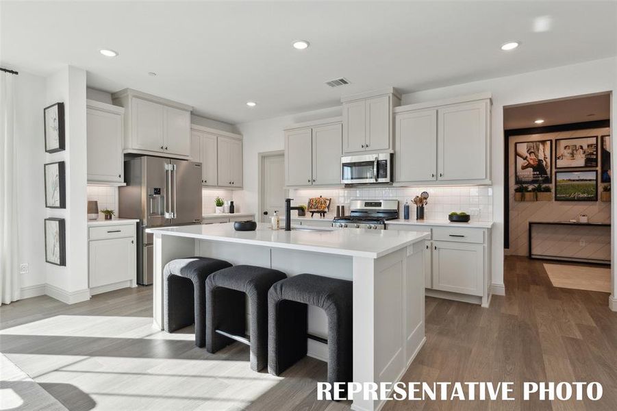 Gorgeous cabinetry paired with stylish finishes can be found in your new dream kitchen!  REPRESENTATIVE PHOTO