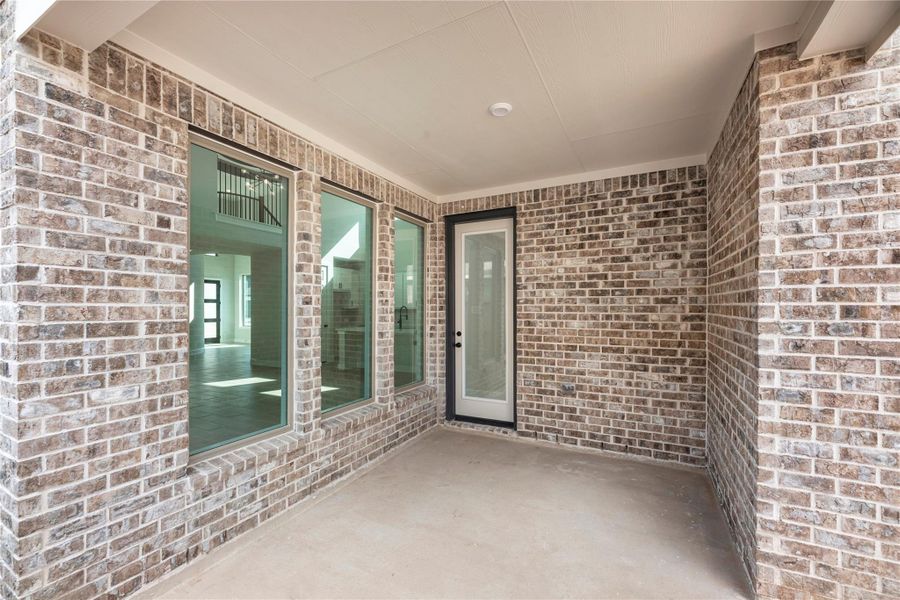 Exterior details and patio area of a home in Candela South, Richmond (Image 3).