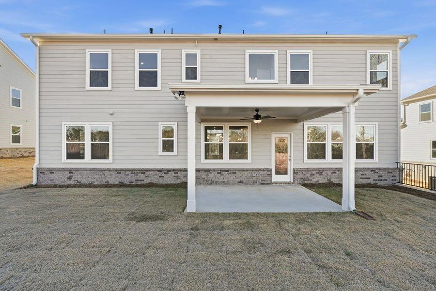 Exterior details and patio area of a home in Stratford Hills, Ball Ground (Image 3).