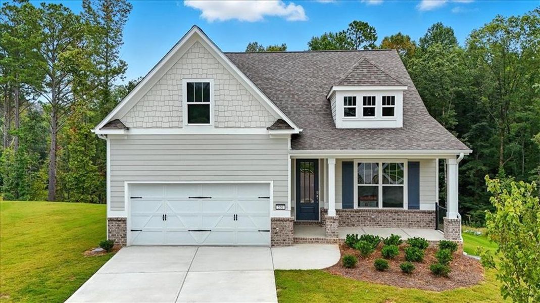 Front exterior of a new home in Stratford at NatureWalk, Dallas, GA, highlighting curb appeal (Image 26). Front exterior of a new home in Stratford at NatureWalk, Dallas, GA, highlighting curb appeal (Image 26).