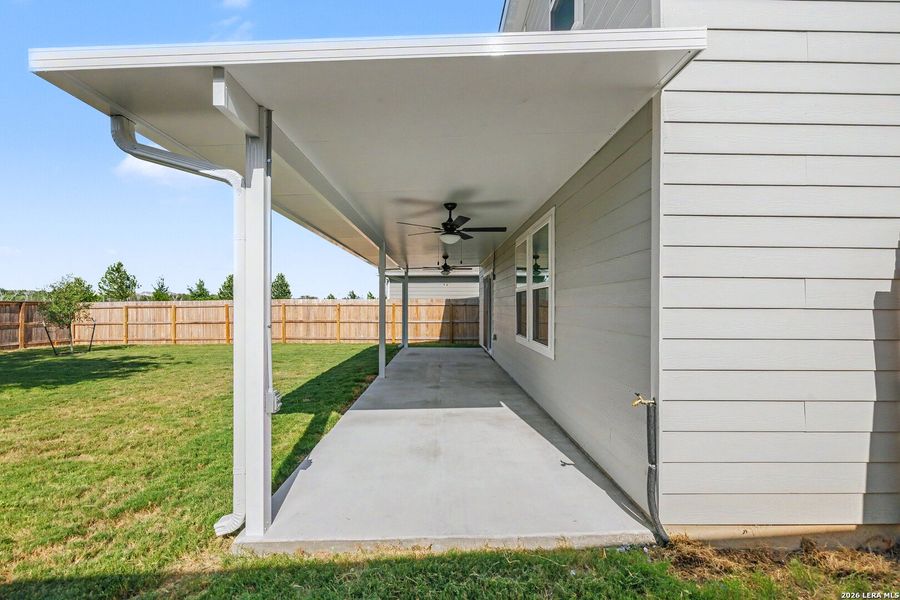 Exterior details and patio area of a home in Hennersby Hollow, San Antonio (Image 20).