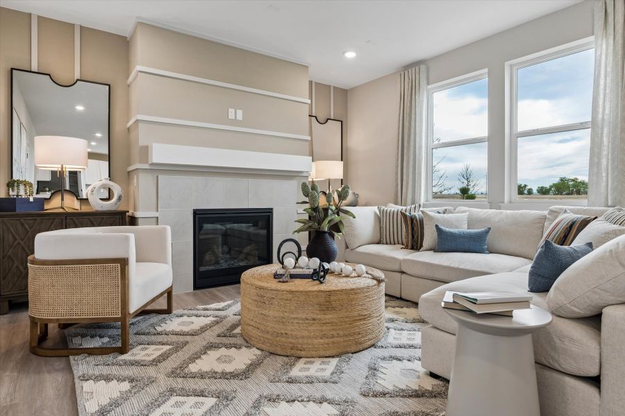 A living room with a fireplace. A living room with a fireplace.