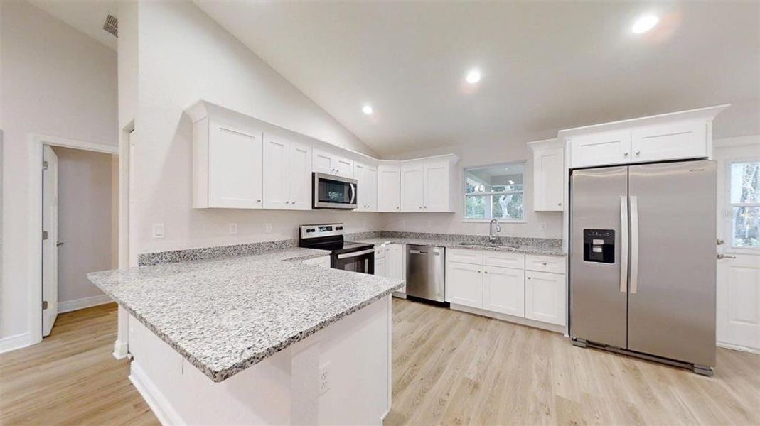 Furnished interior view inside a new home in , Dunnellon (Image 3).