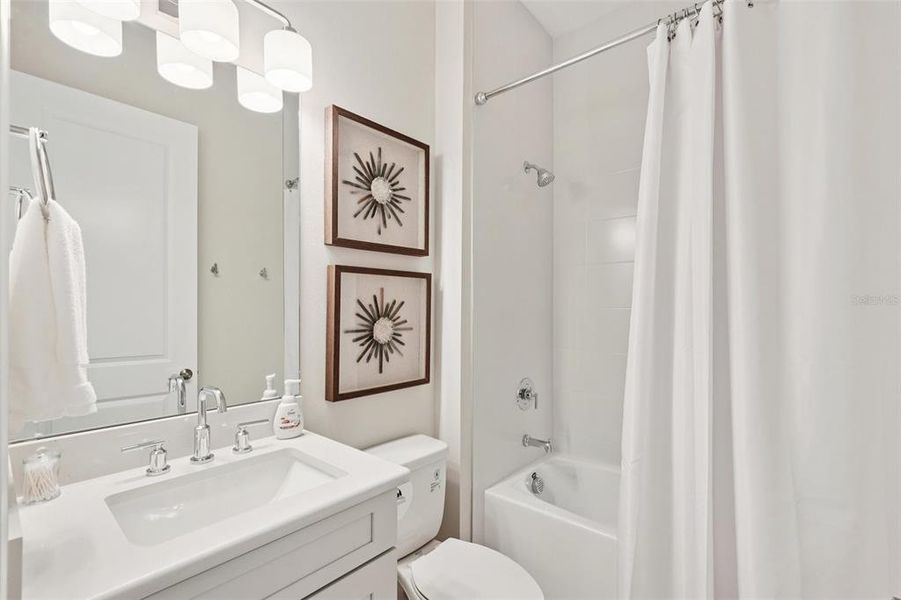 Furnished interior view inside a new home in Esplanade at Azario Lakewood Ranch, Bradenton (Image 38).