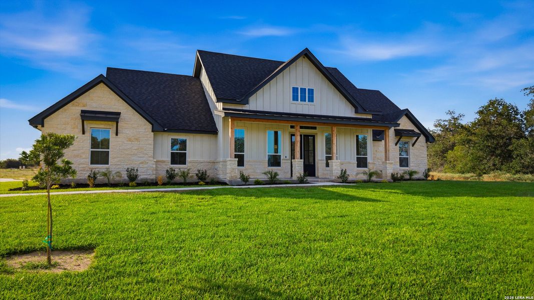 Front exterior of a new home in , Floresville, TX, highlighting curb appeal (Image 1). Front exterior of a new home in , Floresville, TX, highlighting curb appeal (Image 1).