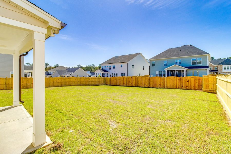 Exterior details and patio area of a home in Pebble Branch, Chapin (Image 4). Exterior details and patio area of a home in Pebble Branch, Chapin (Image 4).