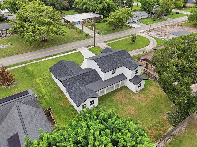 Front exterior of a new home in , Longwood, FL, highlighting curb appeal (Image 23). Front exterior of a new home in , Longwood, FL, highlighting curb appeal (Image 23).