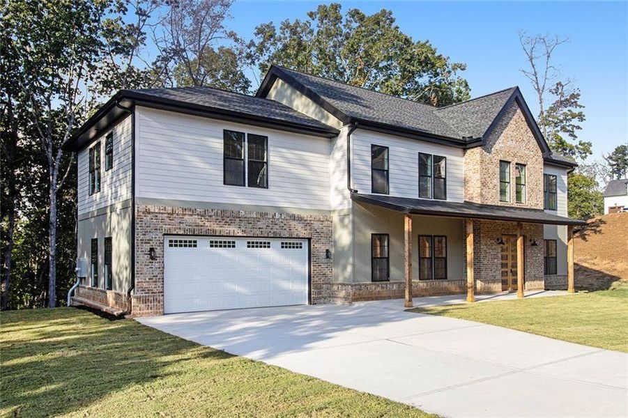 Front exterior of a new home in , Dawsonville, GA, highlighting curb appeal (Image 21). Front exterior of a new home in , Dawsonville, GA, highlighting curb appeal (Image 21).