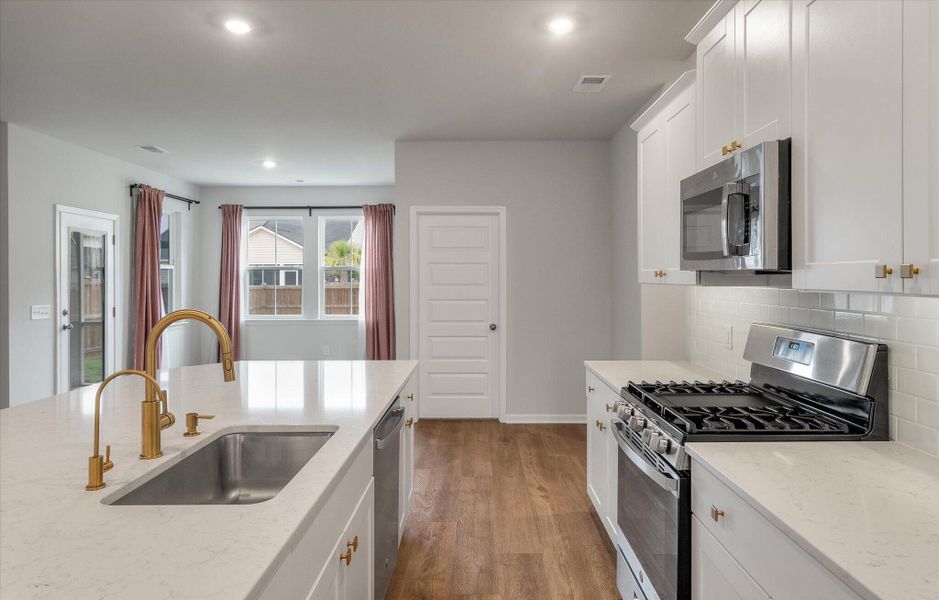 Furnished interior view inside a new home in Sweetgrass at Summers Corner, Summerville (Image 16).