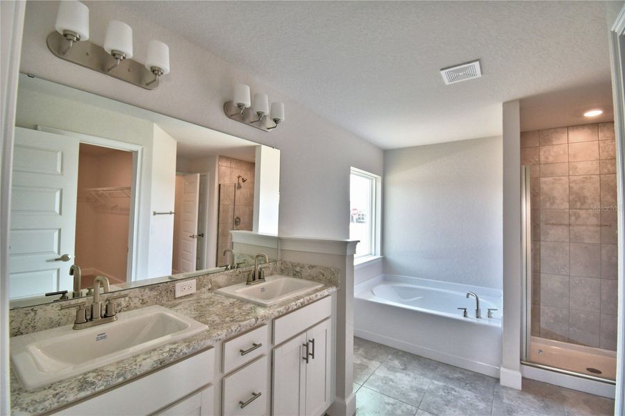 Furnished interior view inside a new home in Cadence Crossing, Auburndale (Image 10).