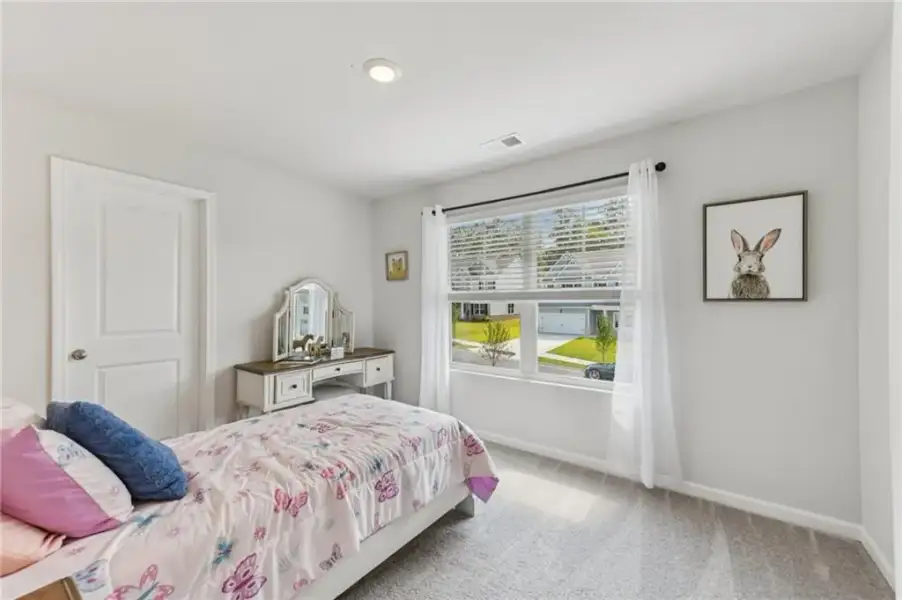Furnished interior view inside a new home in The Hills at Cedar Creek, Winder (Image 49).