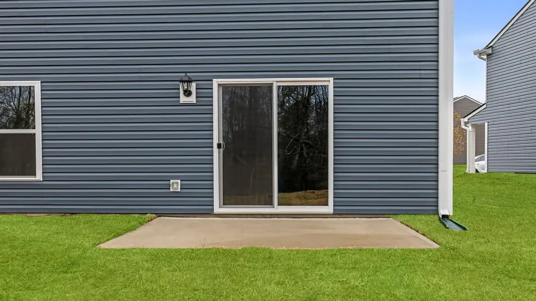 Exterior details and patio area of a home in Seneca Falls, Seneca (Image 3).