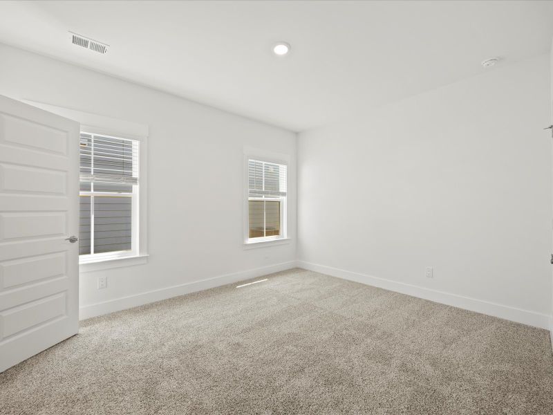Spacious, unfurnished interior of a new home in The Coves at Lakes of Cane Bay II, Summerville (Image 27). Spacious, unfurnished interior of a new home in The Coves at Lakes of Cane Bay II, Summerville (Image 27).