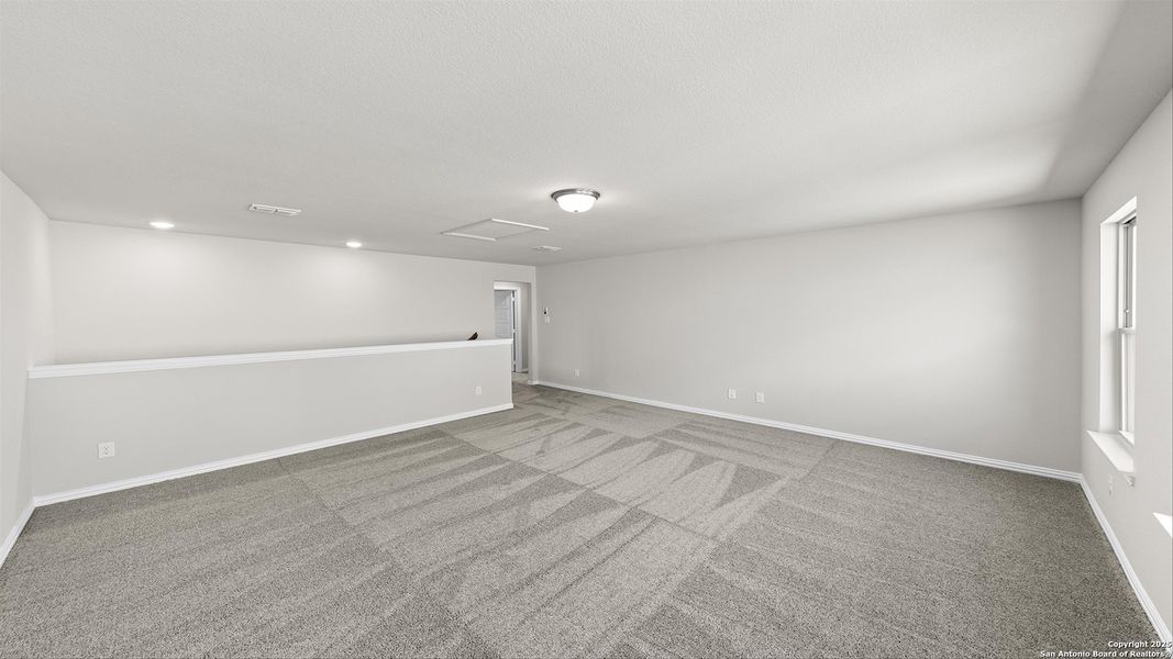 Spacious, unfurnished interior of a new home in Vista Ridge, Live Oak (Image 15).