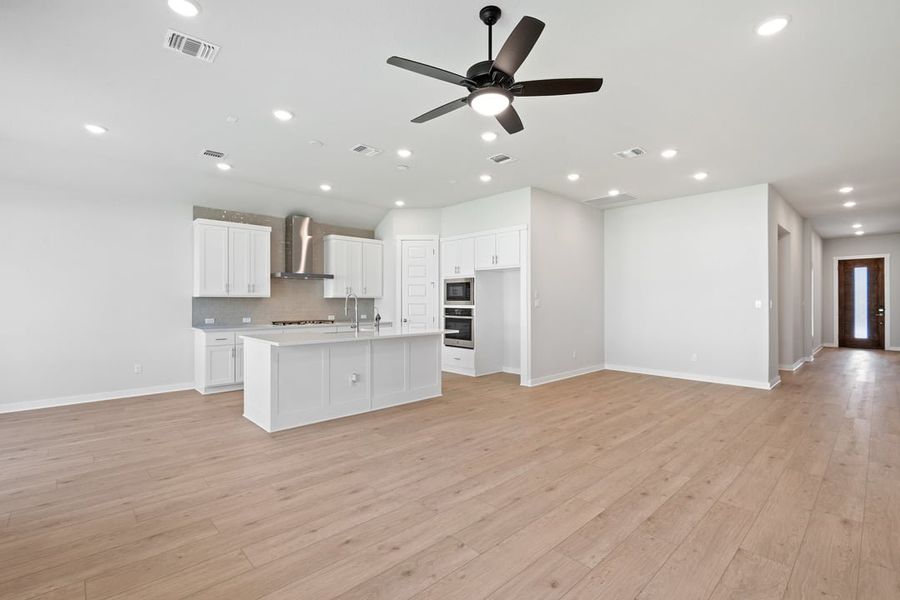 Furnished interior view inside a new home in Park Collection at Lariat, Liberty Hill (Image 7). Furnished interior view inside a new home in Park Collection at Lariat, Liberty Hill (Image 7).