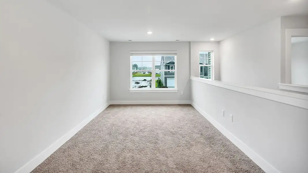 Spacious, unfurnished interior of a new home in The Townes at Cedar Hill Landing, Navassa (Image 23).