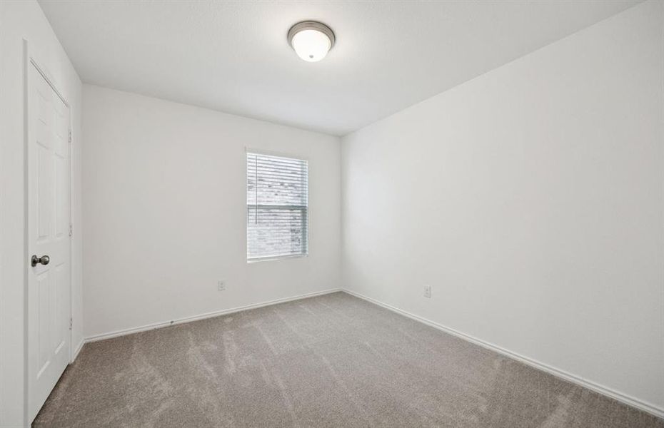 Secondary bedroom designed for comfort and convenience