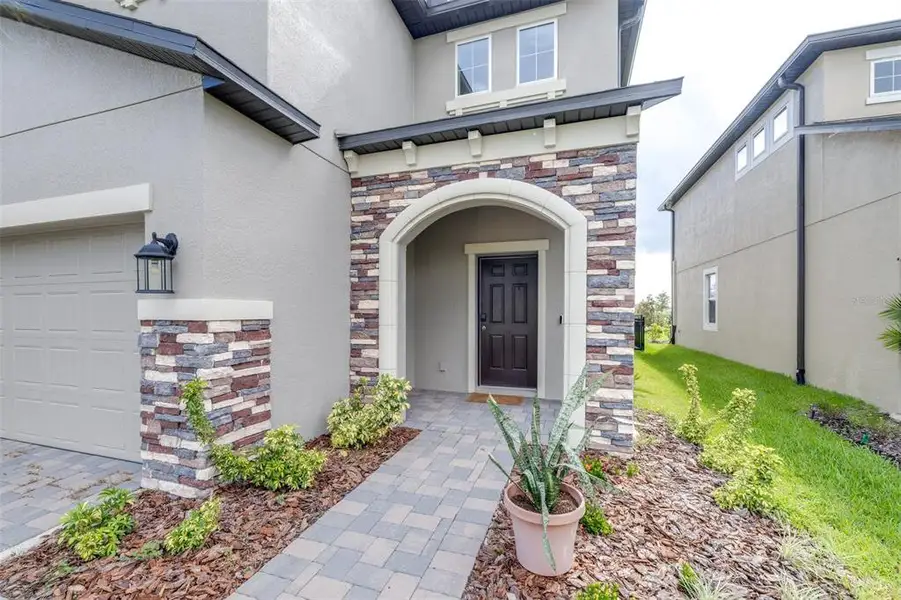 Exterior details and patio area of a home in Hawthorne Ranch, Lakeland (Image 3). Exterior details and patio area of a home in Hawthorne Ranch, Lakeland (Image 3).