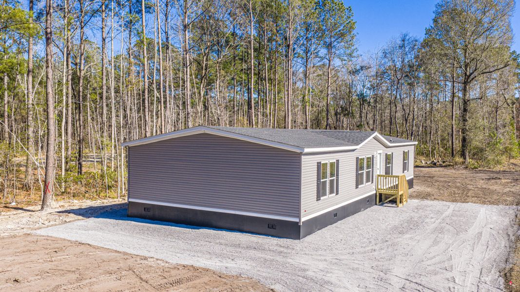Exterior details and patio area of a home in , Summerville (Image 14).