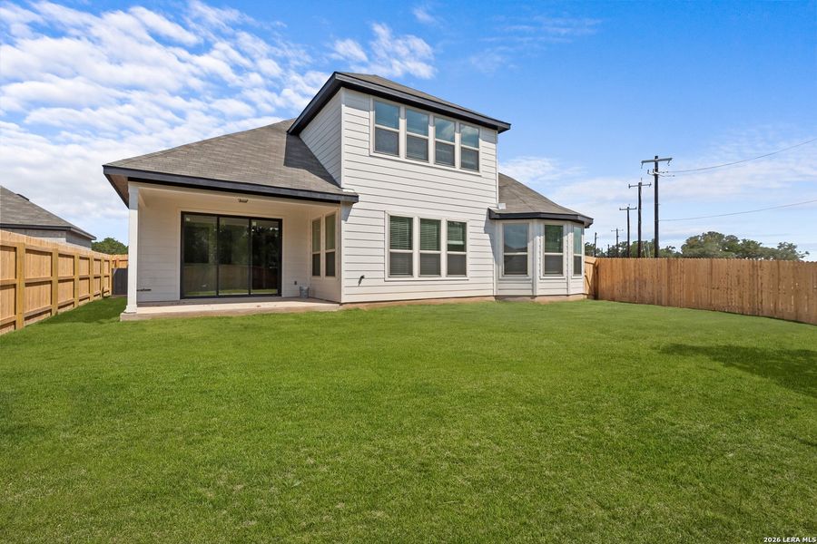 Exterior details and patio area of a home in Davis Ranch, San Antonio (Image 25).
