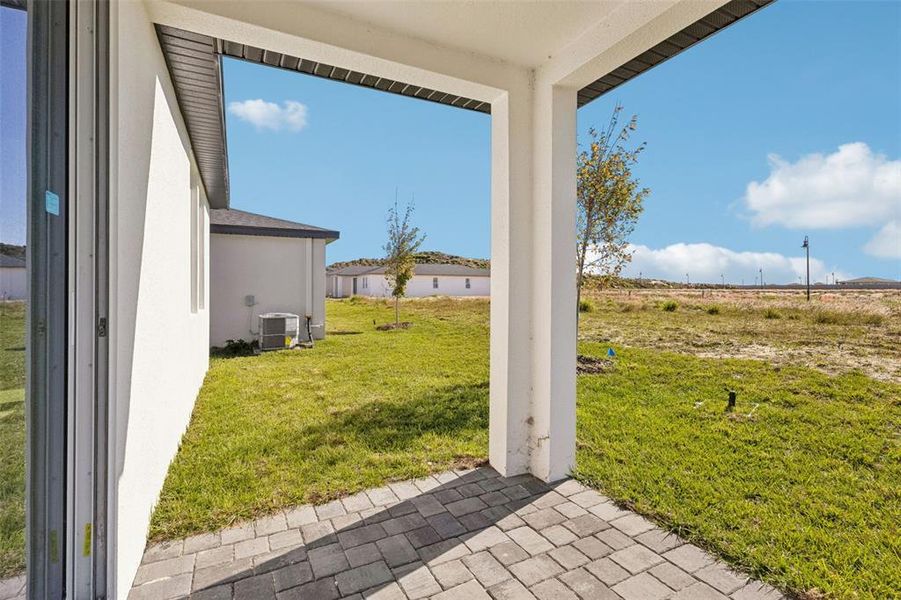 Exterior details and patio area of a home in Crosswinds - Classic Series, Haines City (Image 22).