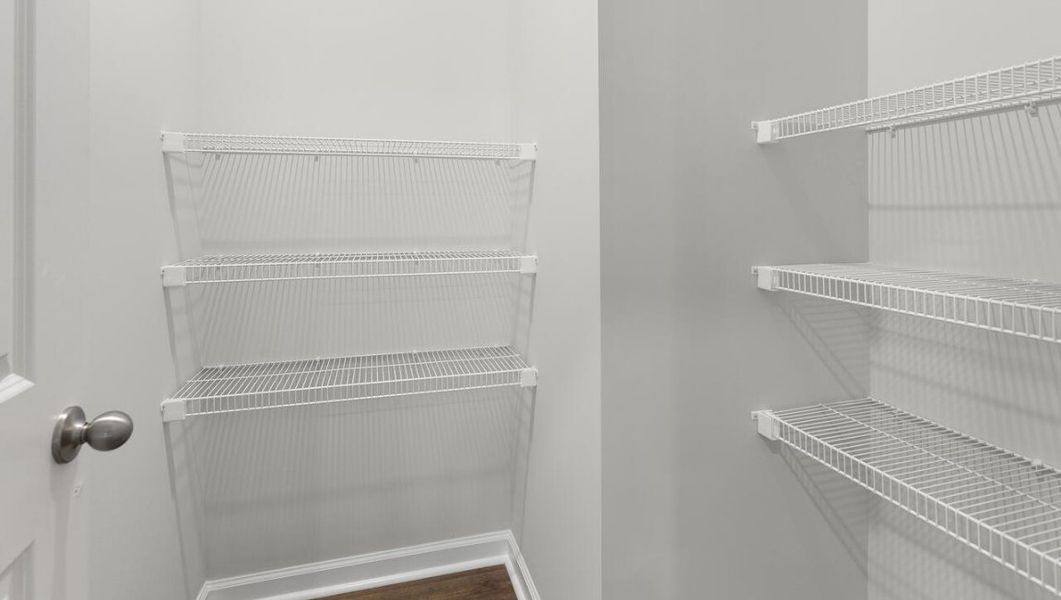 Representative unfurnished interior of a home built from the WOODSTOCK by D.R. Horton in Surfside Landing, Hubert (Image 15).