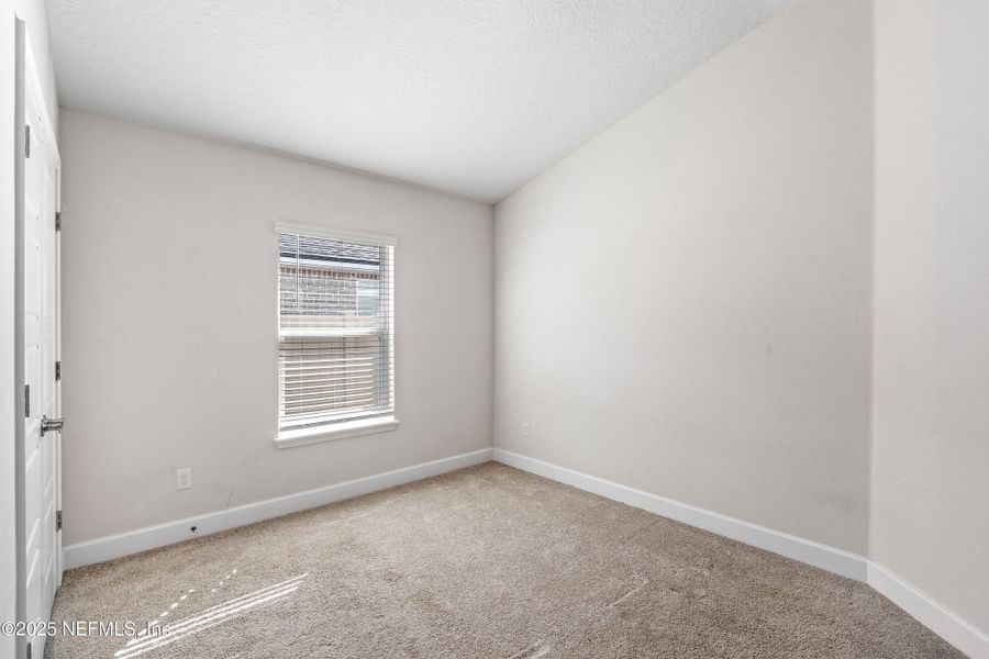 Spacious, unfurnished interior of a new home in Shadow Crest at Rolling Hills, Green Cove Springs (Image 15).