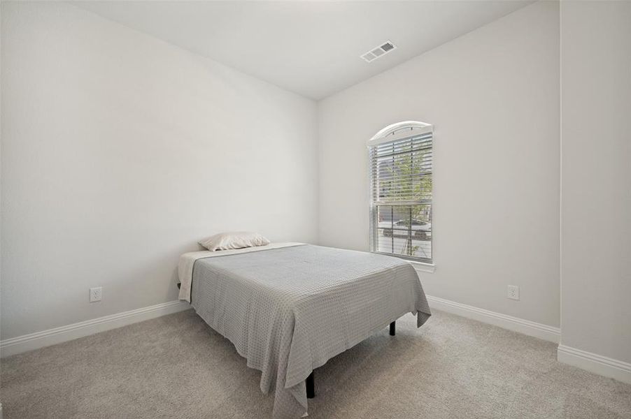 Private secondary suite with ensuite bath and attached living space—perfect for caregivers, multigenerational living, or long-term guests Private secondary suite with ensuite bath and attached living space—perfect for caregivers, multigenerational living, or long-term guests